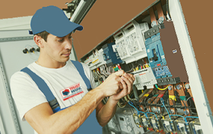 A picture of a Sacramento Electrical professional making an install